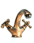 aged copper faucet bathroom sink