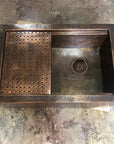 Aged Copper Patina farmhouse sink with flat grid