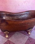 aged copper clowfoot tub