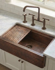 Aged Copper Patina farmhouse sink with flat grid