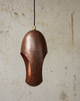 Rustic farmhouse copper pendant light with hammered texture