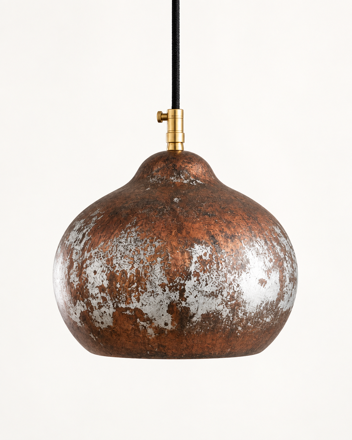 Rustic aged-copper dome pendant light on a clean studio background
