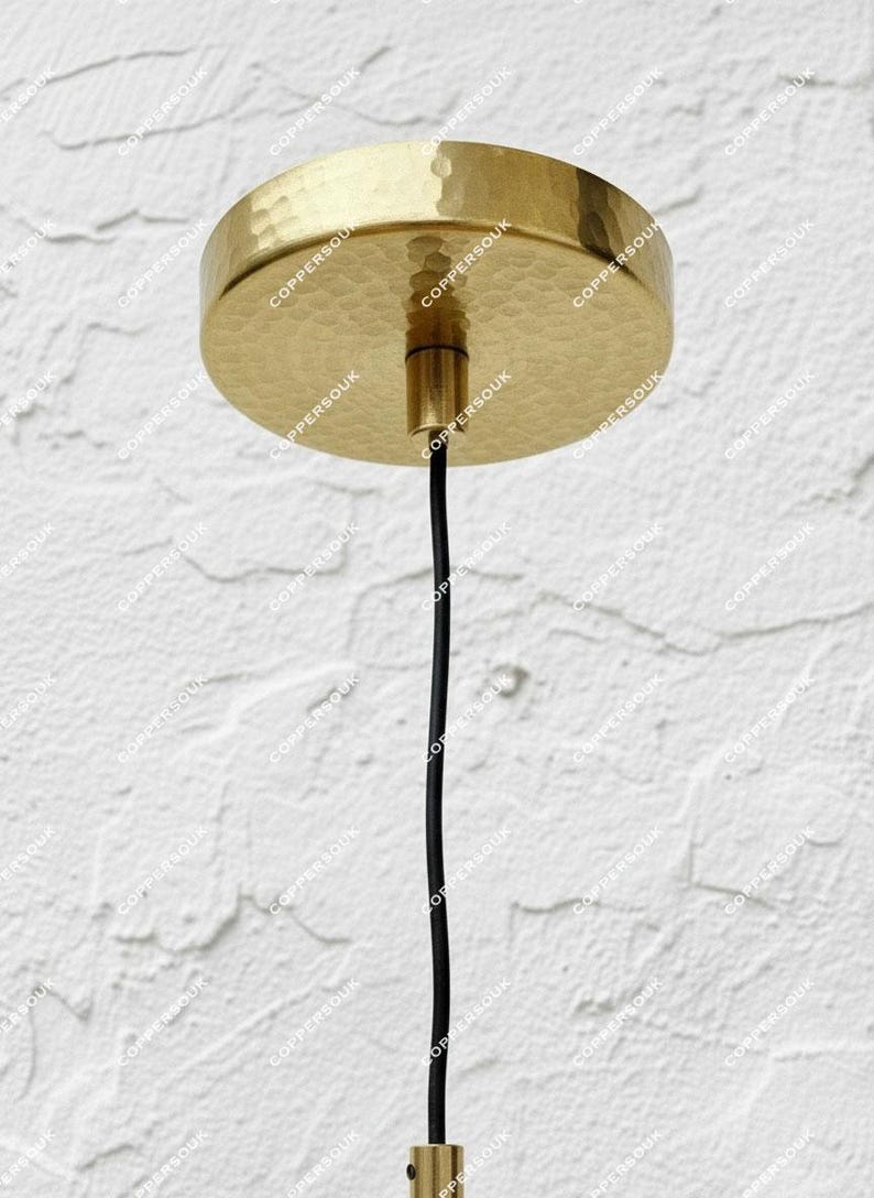Round hammered brass ceiling canopy with black suspension cord
