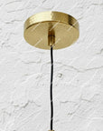 Round hammered brass ceiling canopy with black suspension cord