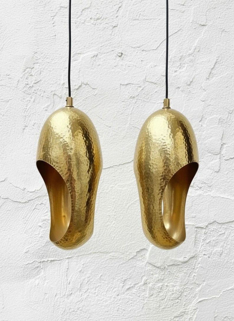 Set of two hammered solid brass sculptural pendant lights