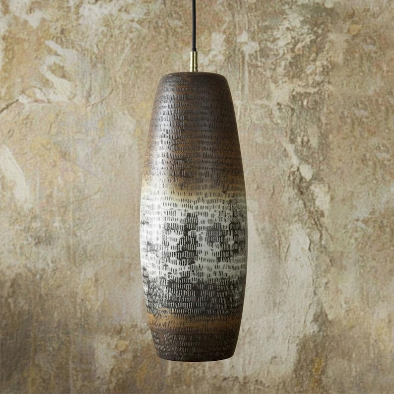 Hand-hammered patina copper pendant light with tall tapered shade