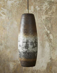 Hand-hammered patina copper pendant light with tall tapered shade
