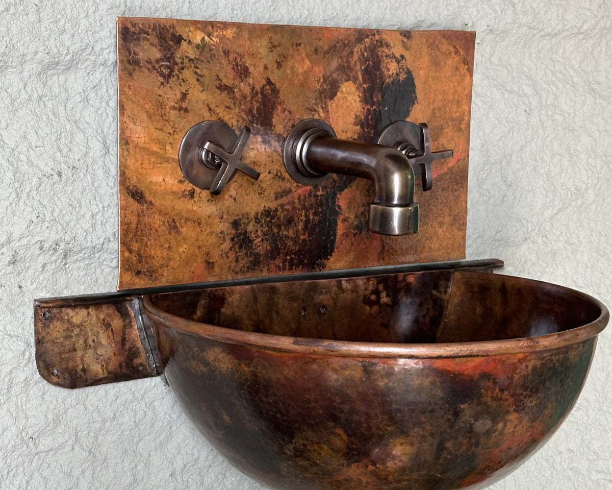 Side view of hammered copper wall-hung sink in Fired Copper finish