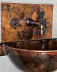 Side view of hammered copper wall-hung sink in Fired Copper finish